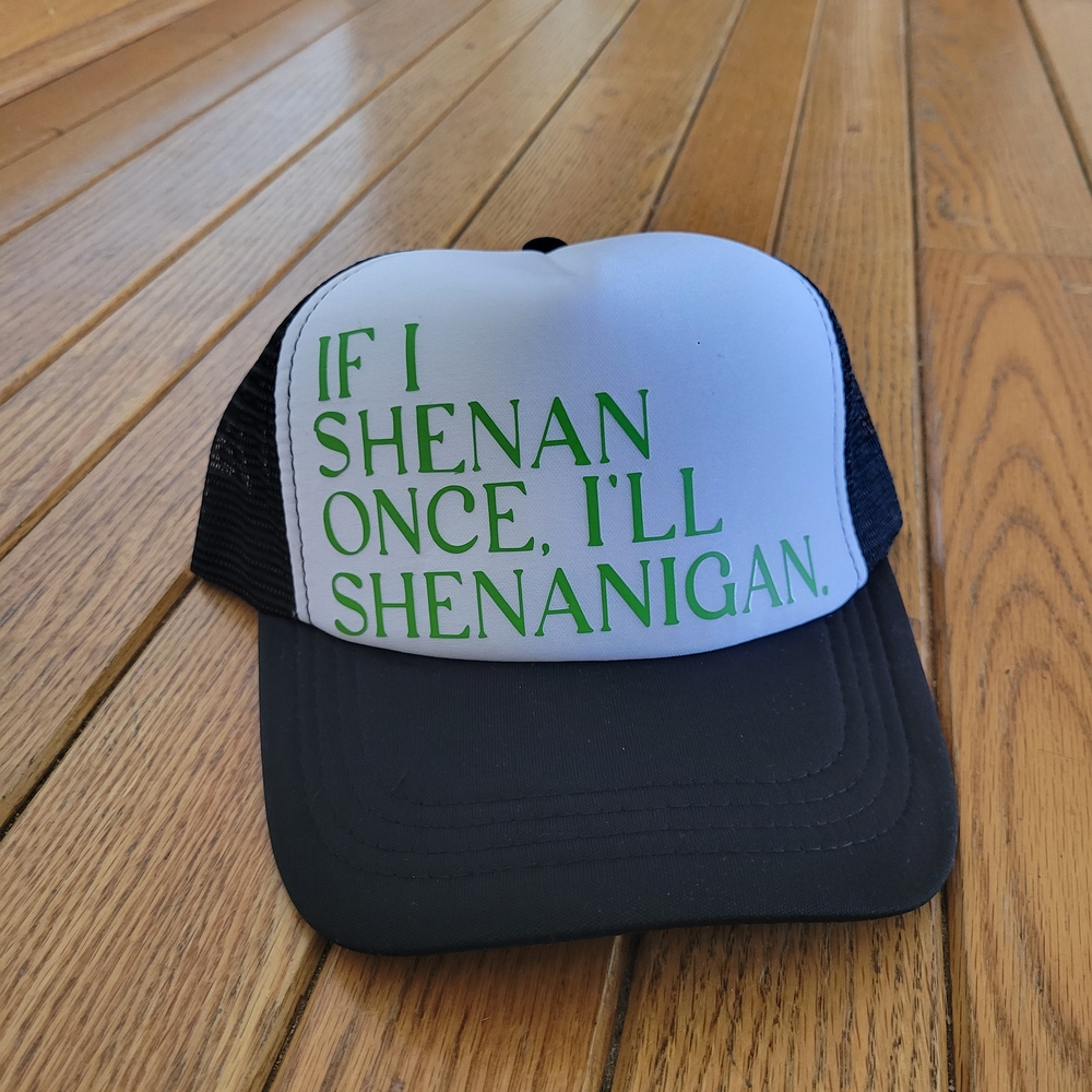 Black and White Trucker Hat with Green Text